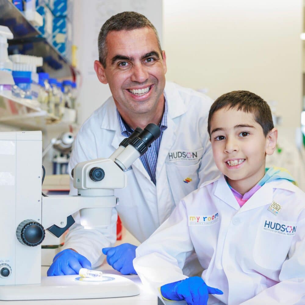 (L-R) Professor Jason Cain with Eli Mohibi (7). Photo Courtesy Aaron Francis / Herald Sun