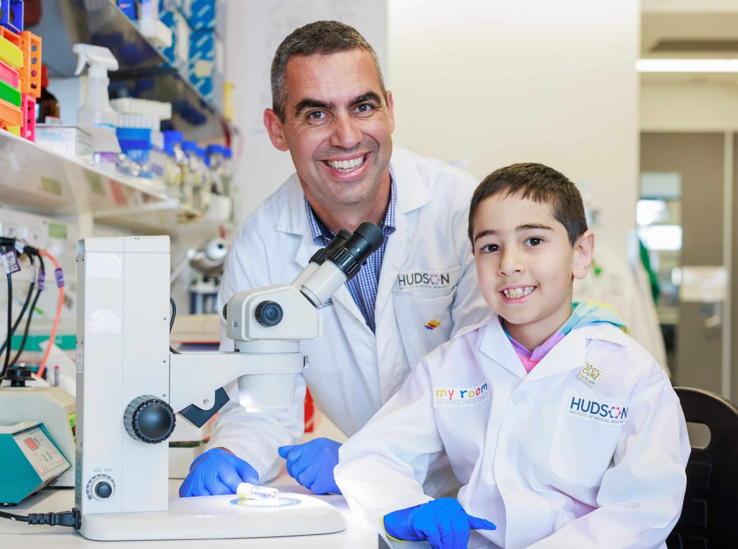 (L-R) Professor Jason Cain with Eli Mohibi (7). Photo Courtesy Aaron Francis / Herald Sun