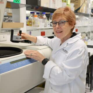 Professor Caroline Gargett in the lab