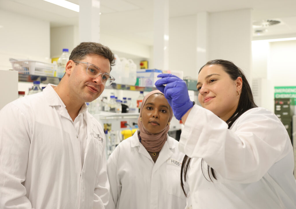 L-R: Dr Robert Galinsky with PhD students Dima Abdu and Kayla Vidinopoulos in the lab at Hudson Institute